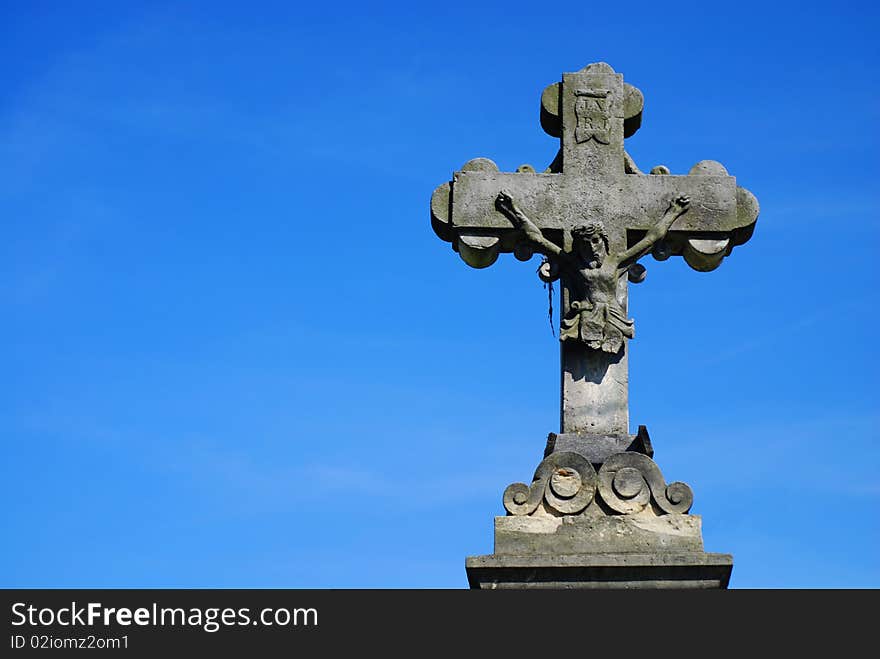 Cross on the blue sky. Cross on the blue sky