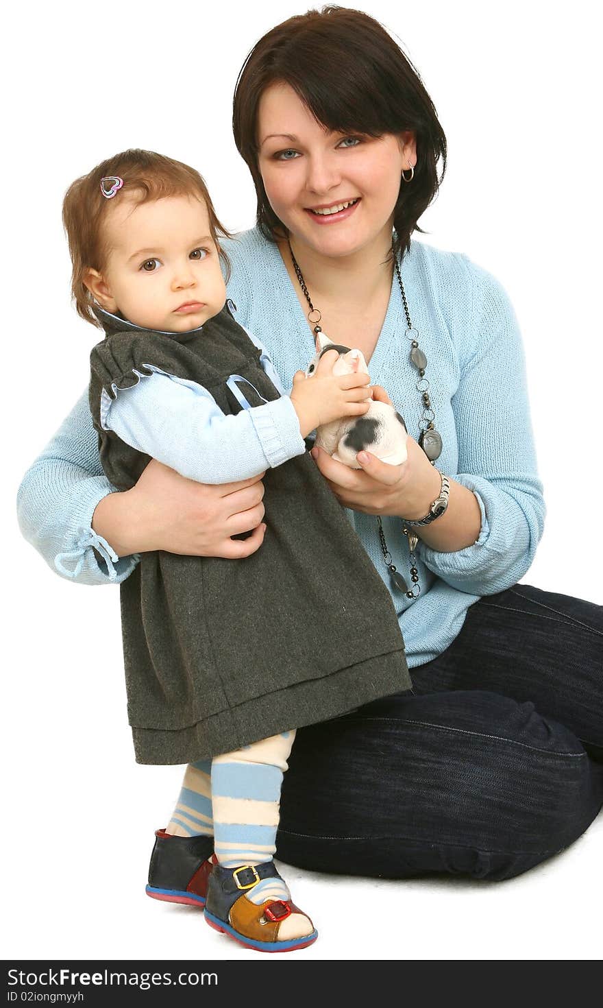 Happy mother with little daughter on white background