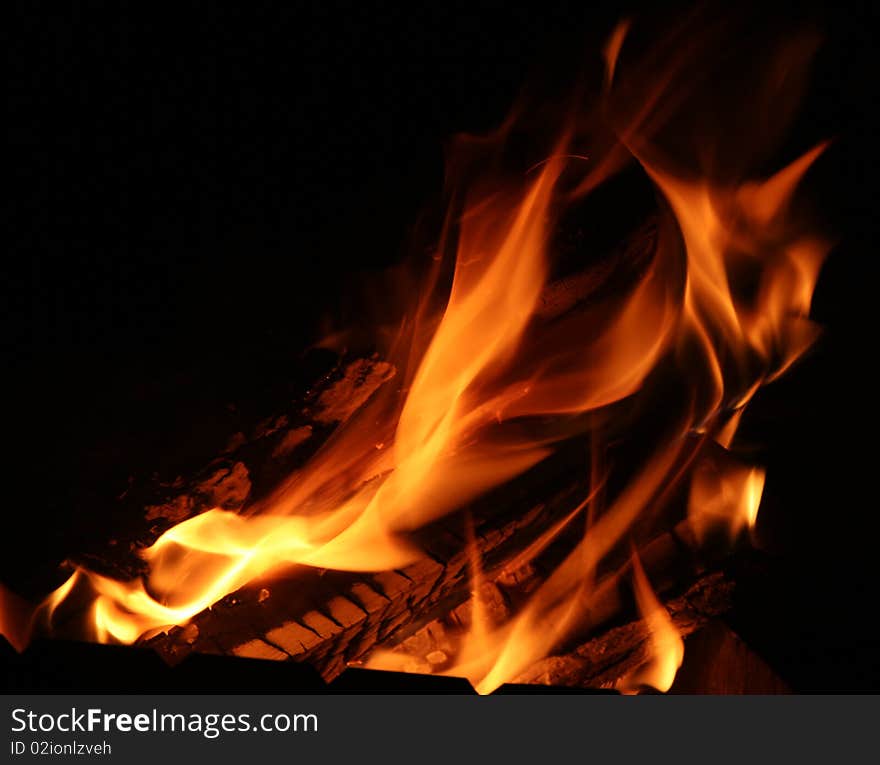 Burning flame on a dark background. Burning flame on a dark background