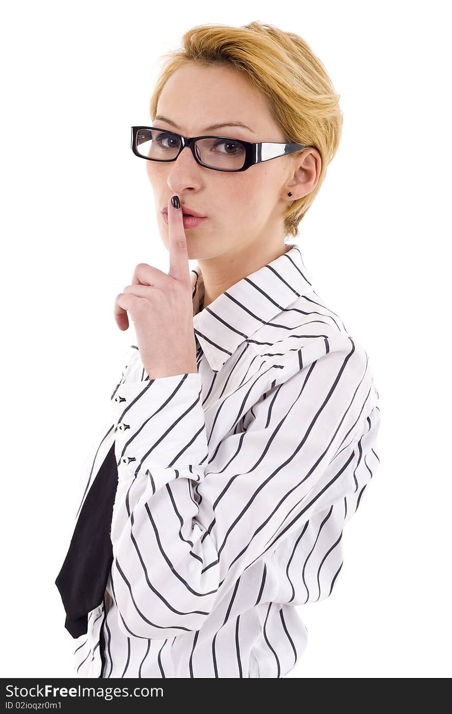 Portrait of young business woman with the finger near her lips