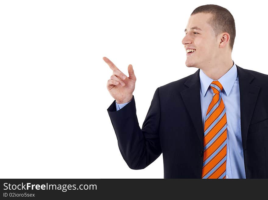 Isolated: An attractive business man pointing at copyspace , over white