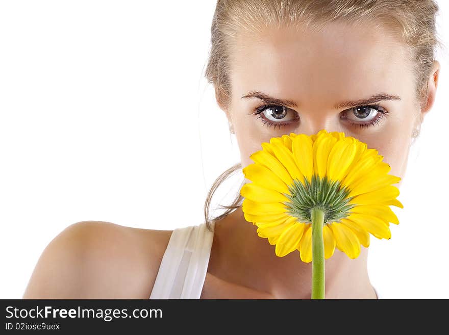 Smelling A Yellow Flower