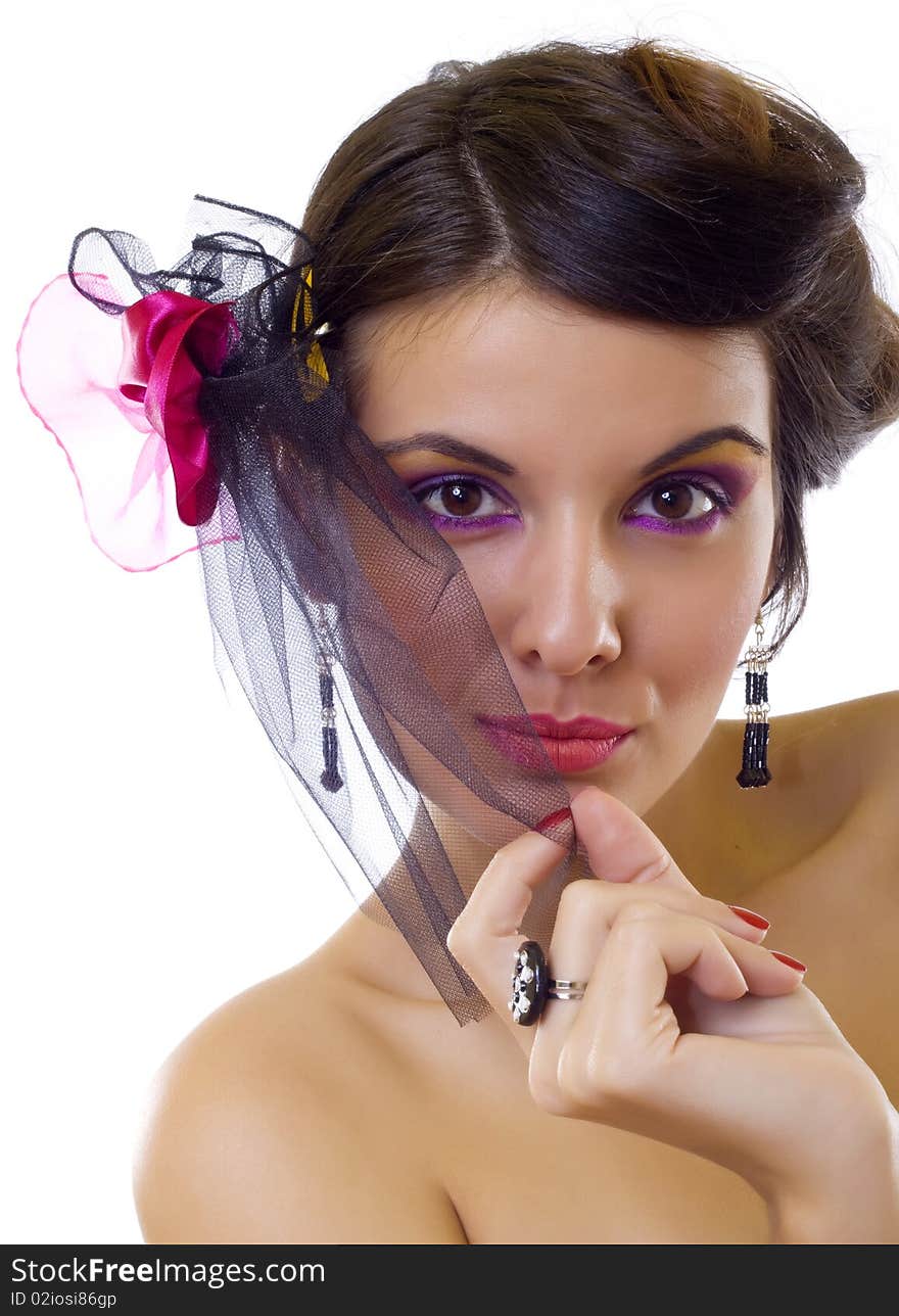 Closeup picture of a beautiful woman wearing a brooch over white