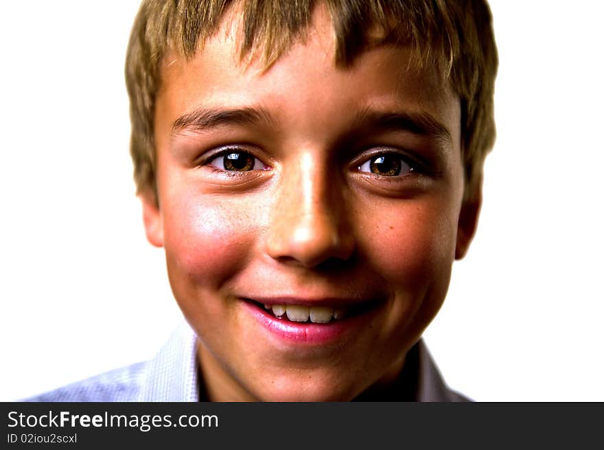 A handsome young boy laughing, isolated on white. A handsome young boy laughing, isolated on white