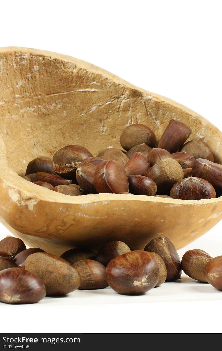 Raw chestnut in a Brown gourd