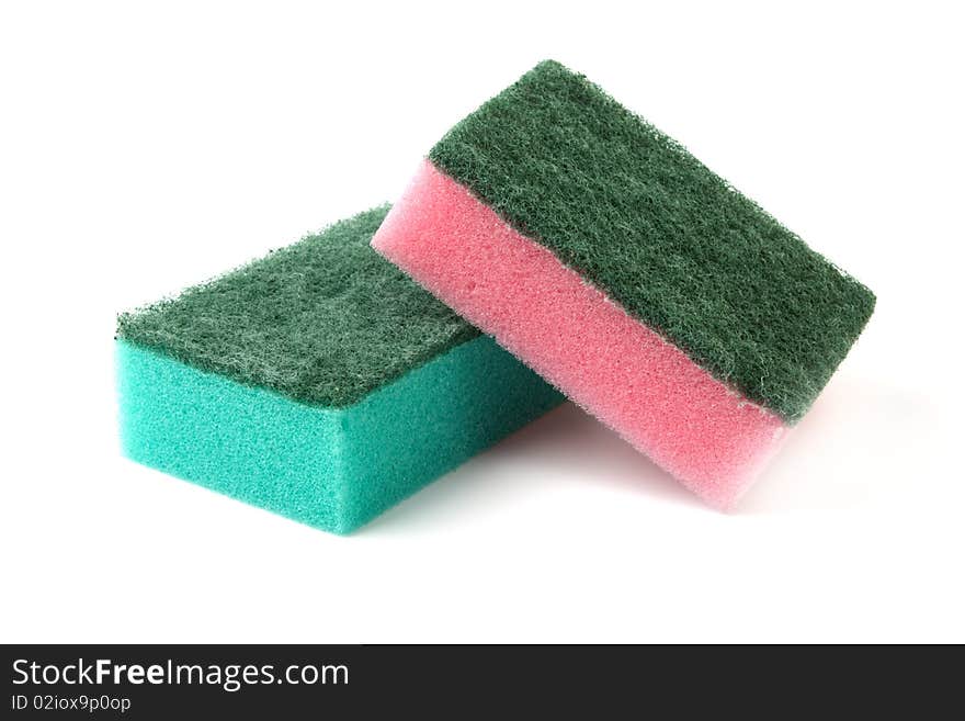 Red and green sponges on a white background it is isolated