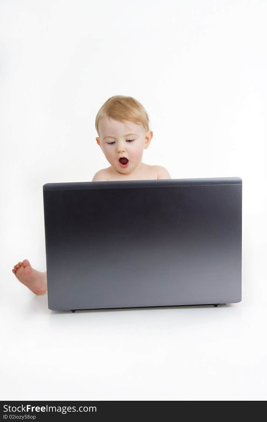 Child with laptop,on white background. Child with laptop,on white background.