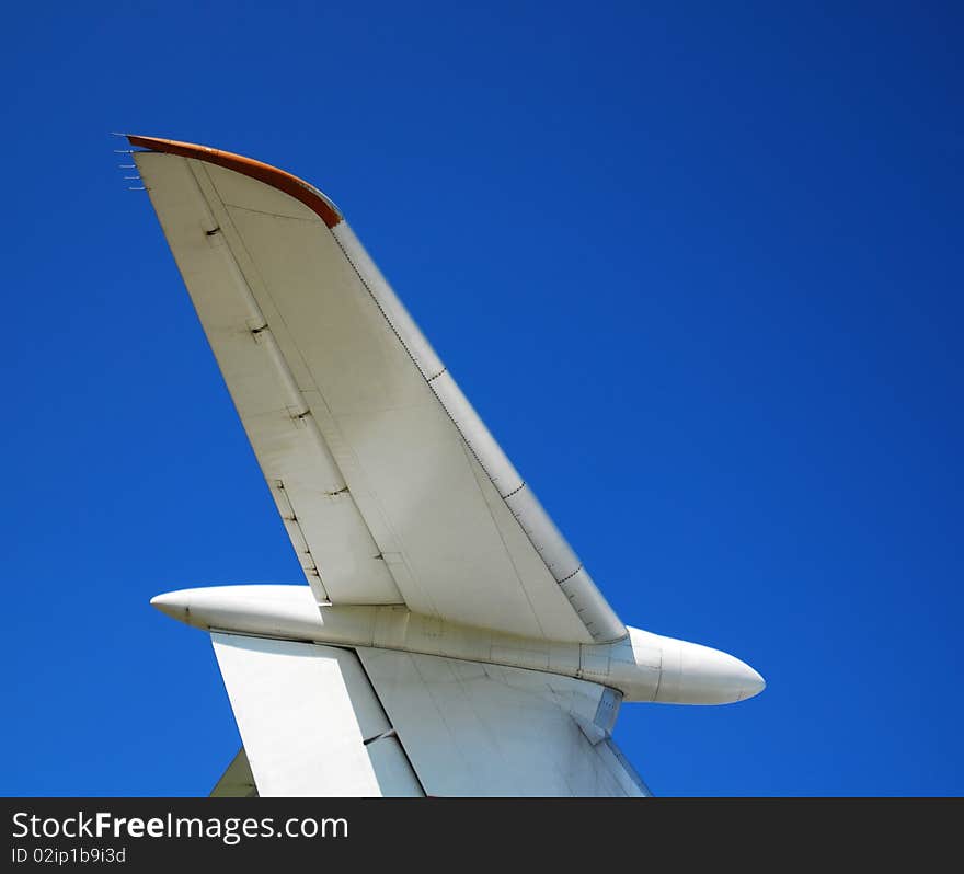 Tailfin of plane against sky. Tailfin of plane against sky