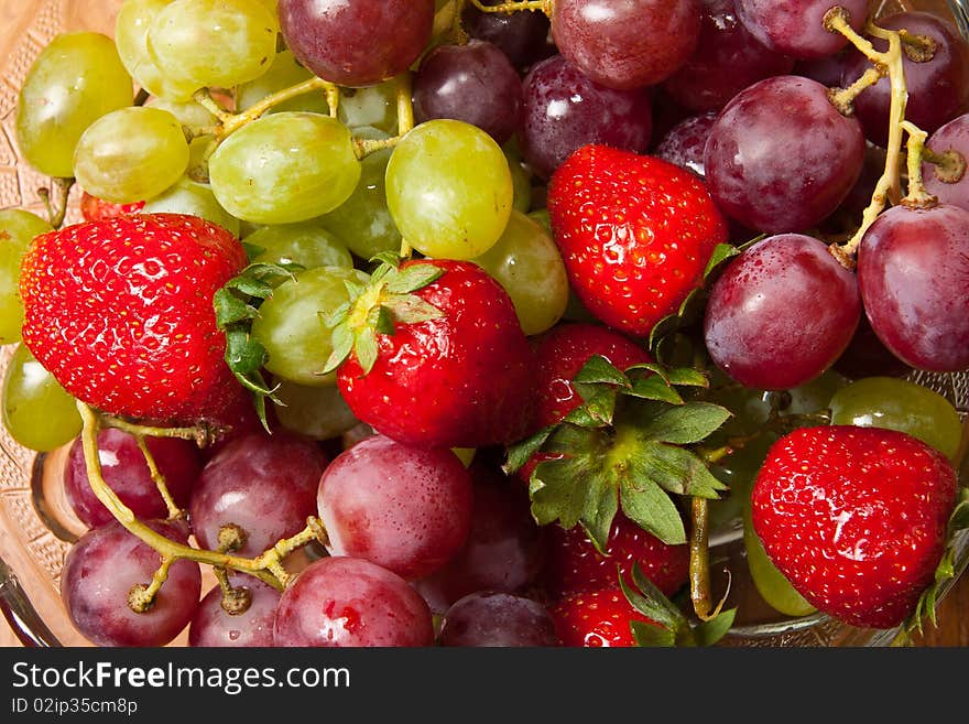 Fresh strawberries and grapes