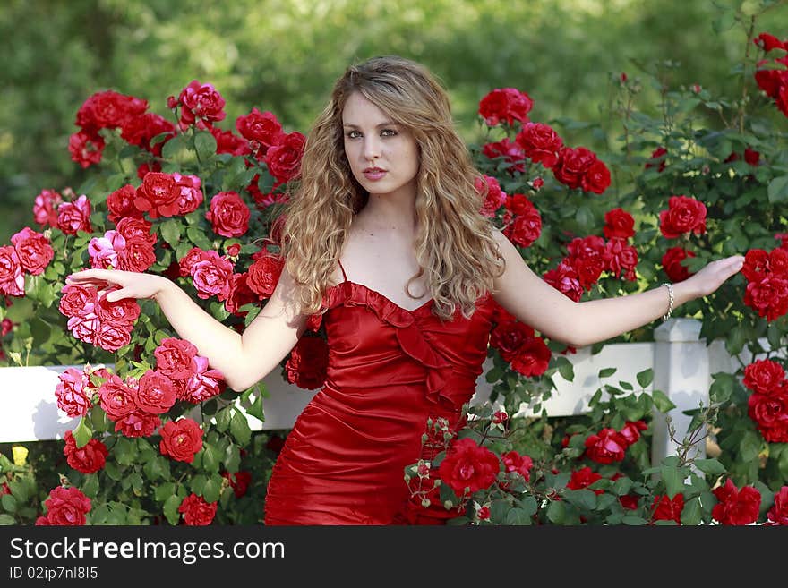 Beautiful female white model with Red Roses