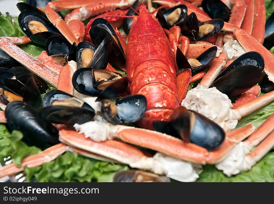 Seafood platter at restaurant with oysters scallops mussels crabs