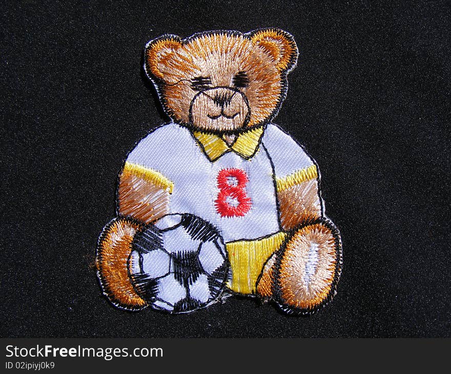 Marked in handmade cotton fabrics for clothing of various colors,animal bear soccer ball football