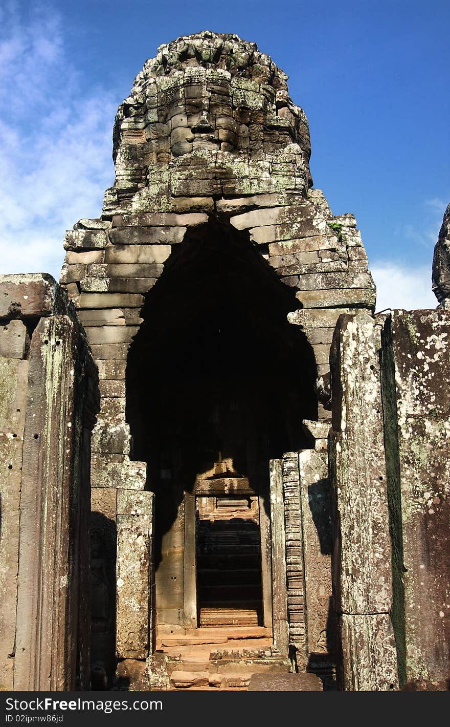 View Through Door Entrance To A Statue Of Bayon