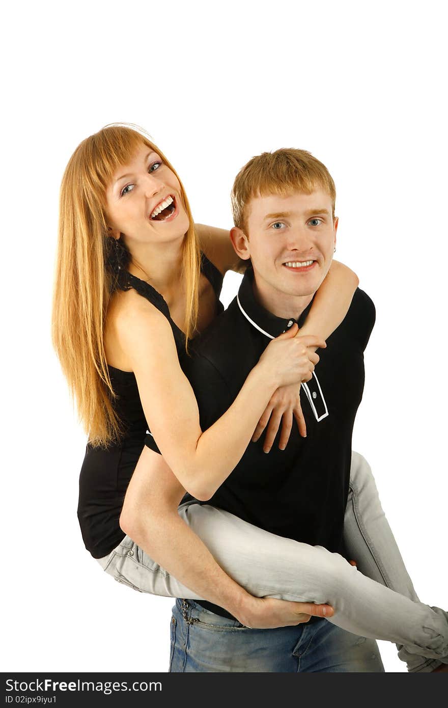 Smiling young couple  isolated  background. Smiling young couple  isolated  background