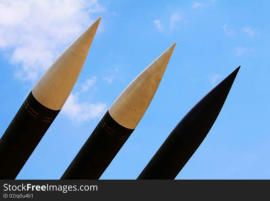 Green rockets and blue sky. Green rockets and blue sky