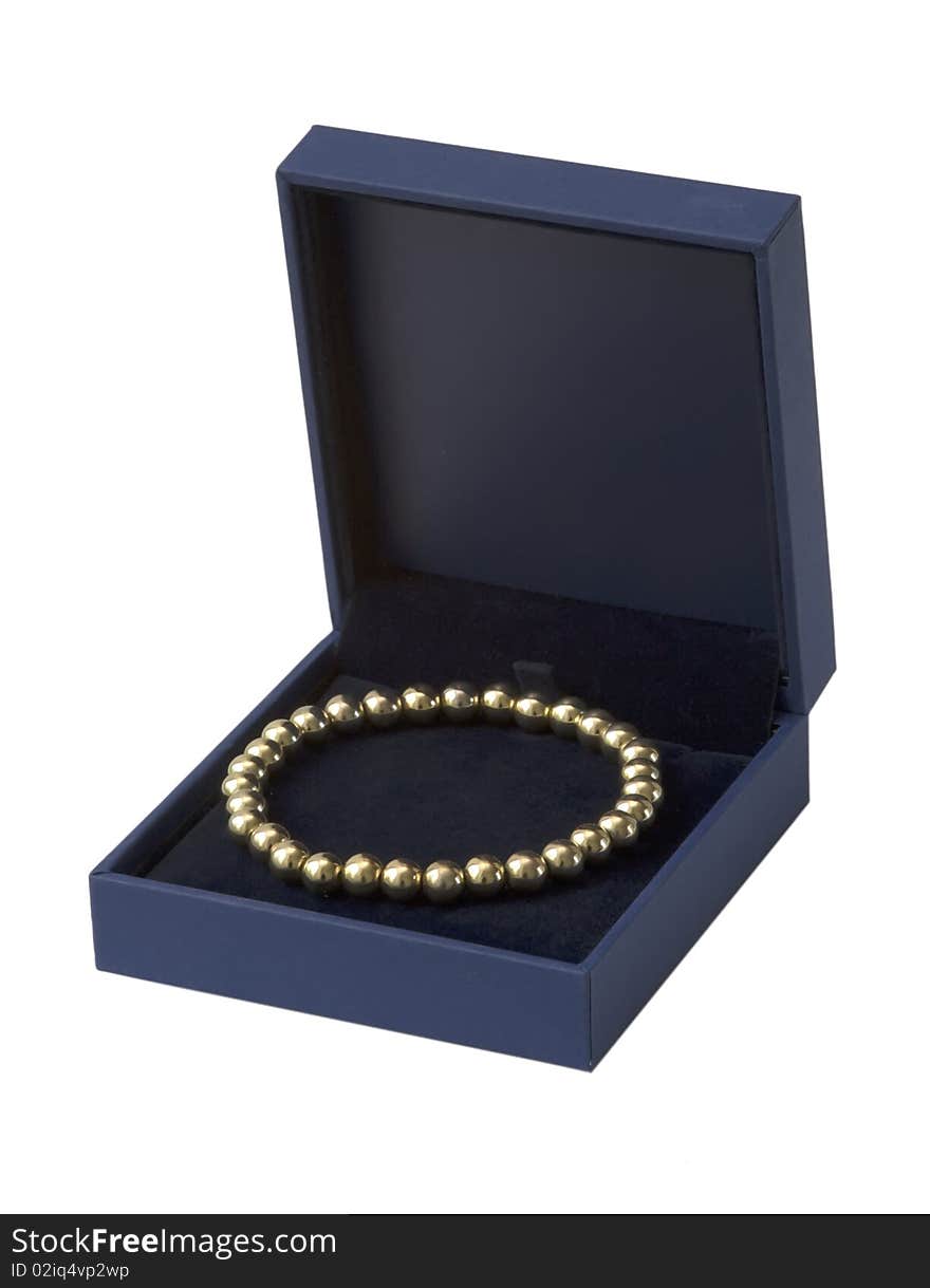 Gift box with gold  bracelet, isolated on the white background