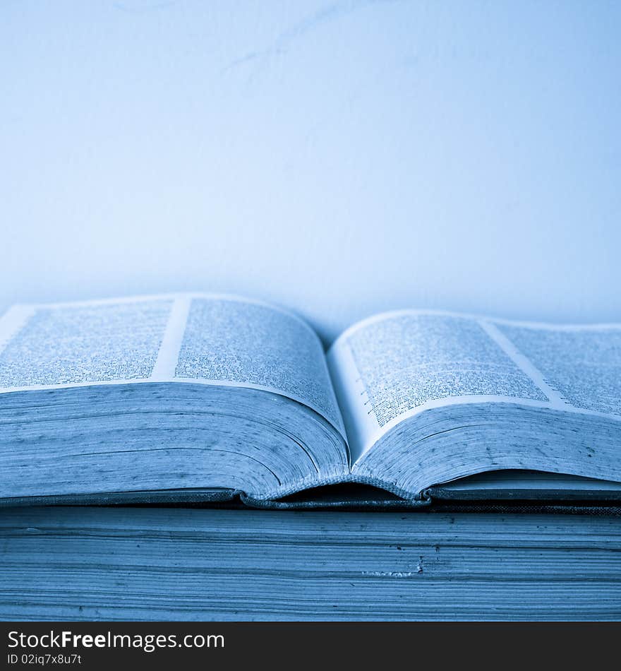 A large stack of old book in home .