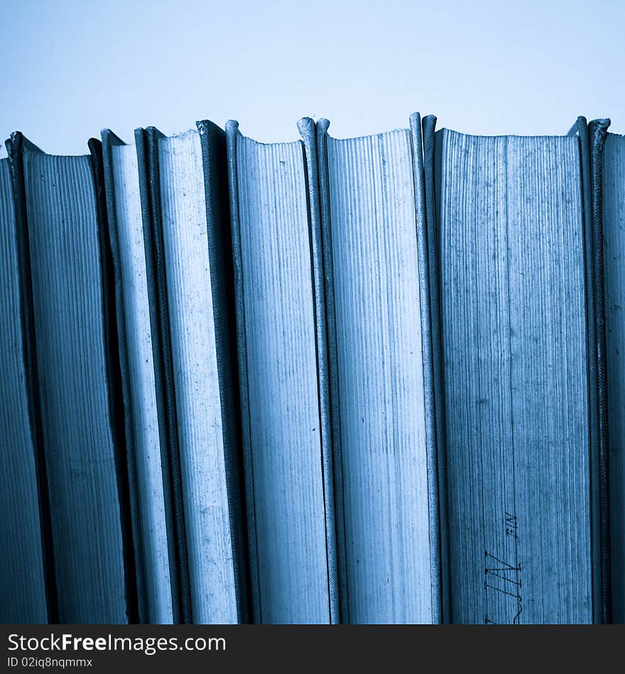 A large stack of old book in home .