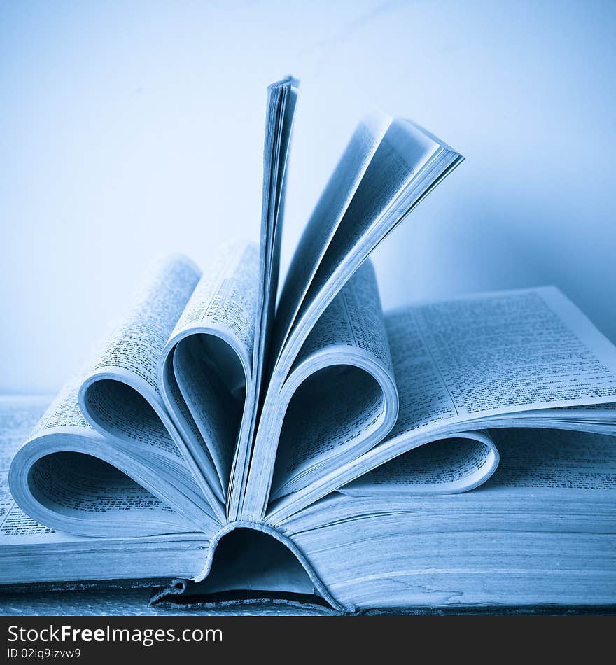 A large stack of old book in home .