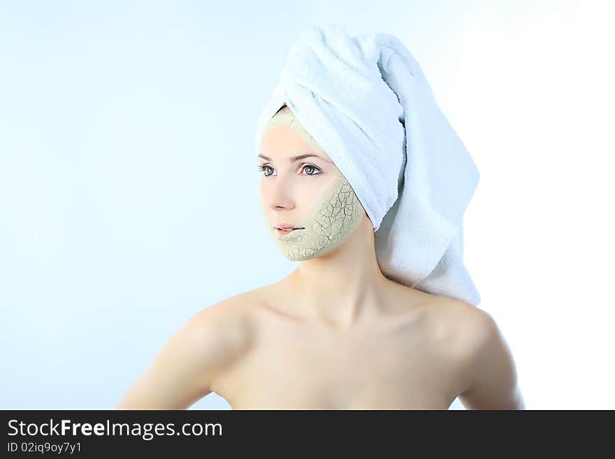 Portrait of a woman with beauty mask on her face. Spa, healthcare. Portrait of a woman with beauty mask on her face. Spa, healthcare.