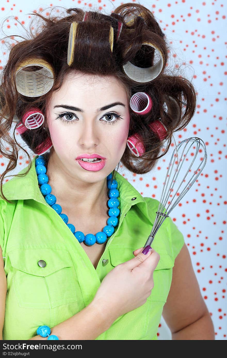 Shot of a funny  woman housewife dressed in retro style. Shot of a funny  woman housewife dressed in retro style.