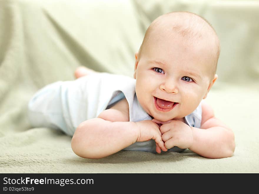 Portrait of laughing baby boy