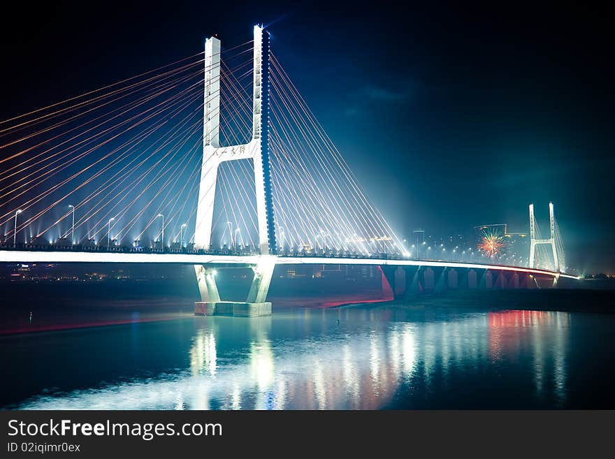 The night view of the bridge nanchang jiangxi china. The night view of the bridge nanchang jiangxi china.