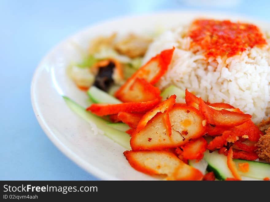 Asian style vegetarian barbecued pork delicacy with spicy chili sauce. Concepts such as diet and nutrition, healthy eating and lifestyle, and food and beverage.