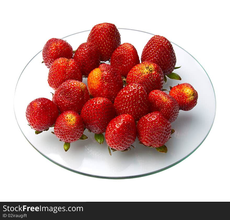 Strawberries are allocated to a round glass. Strawberries are allocated to a round glass