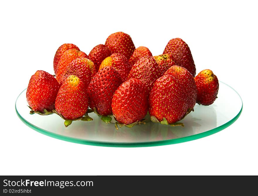 Strawberries are allocated to a round glass. Strawberries are allocated to a round glass