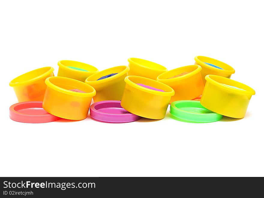 Rows of containers with colorful plasticine