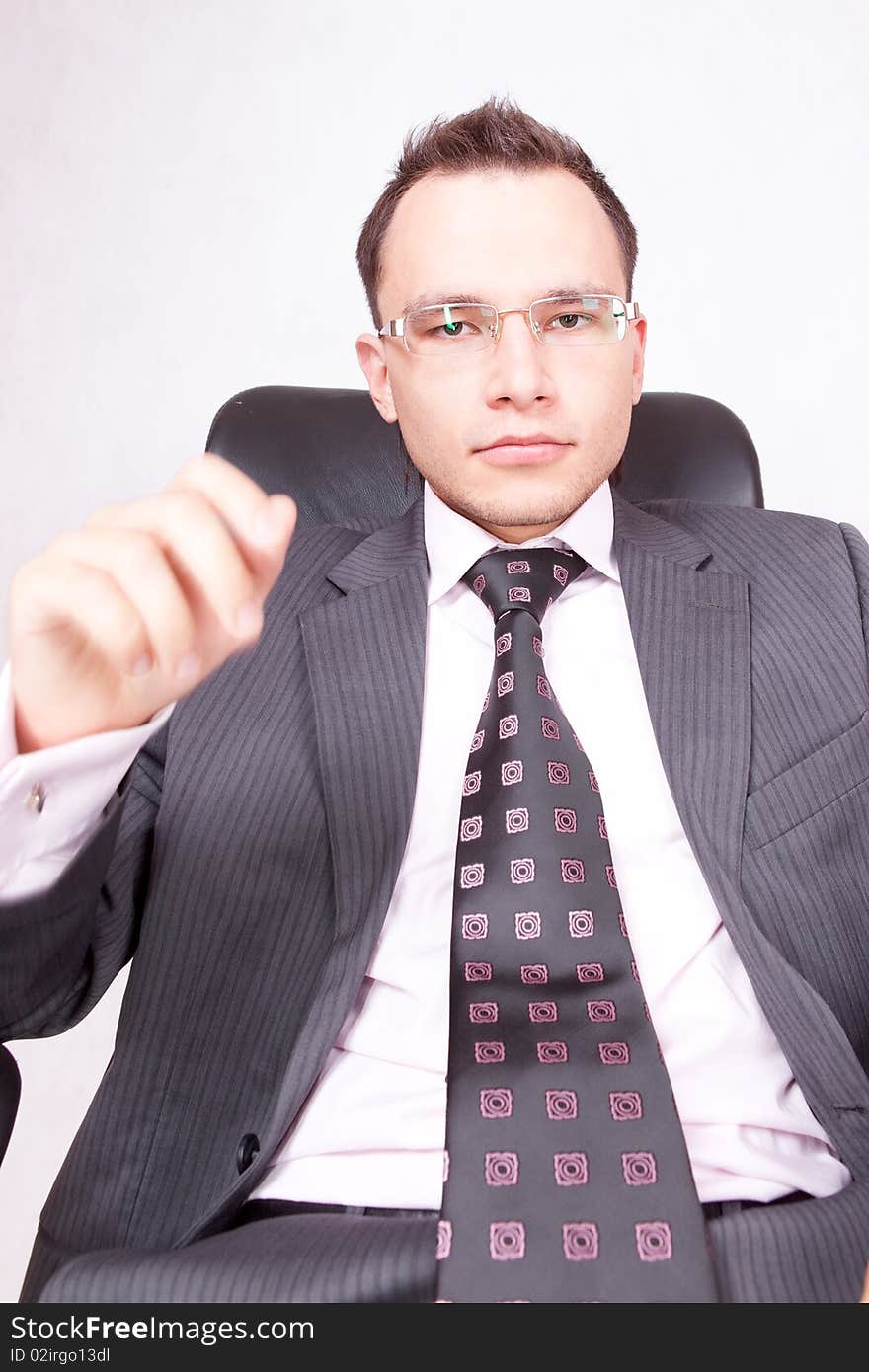 Young businessman with a pair of modern glasses