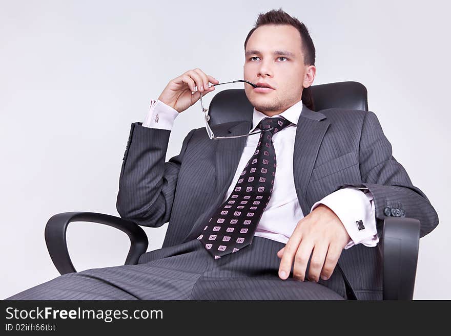 Young businessman with a pair of modern glasses