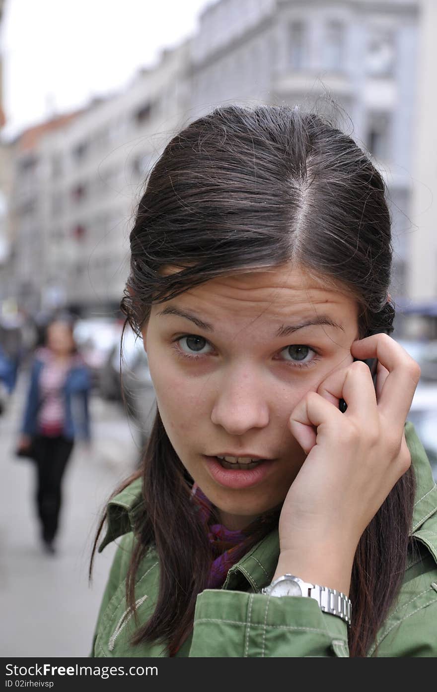 Young girl performs an important call