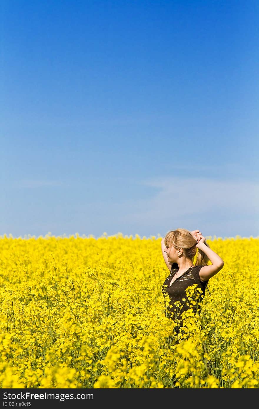 Woman In A Field Of Wildflowers