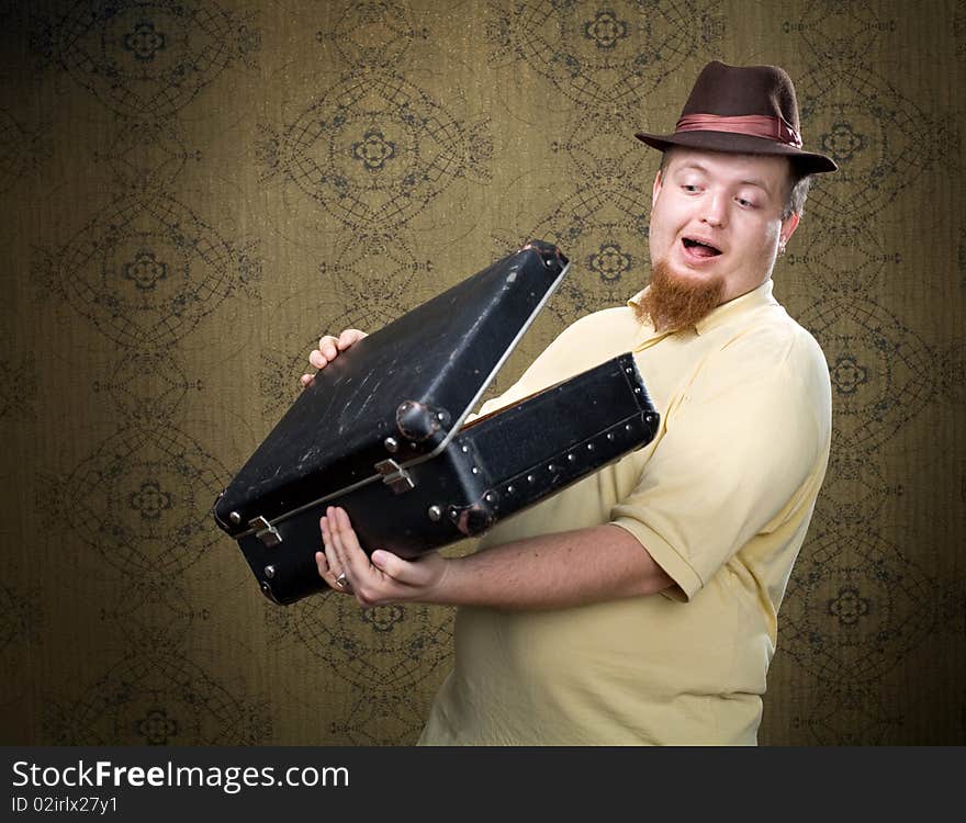 An image of a man with a black case. An image of a man with a black case