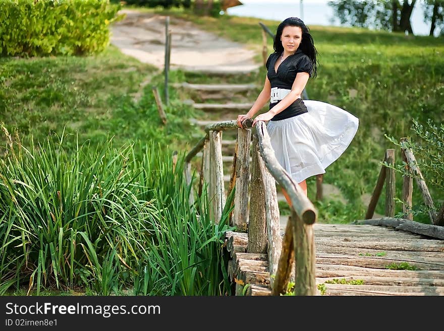 Young girl on the bridge