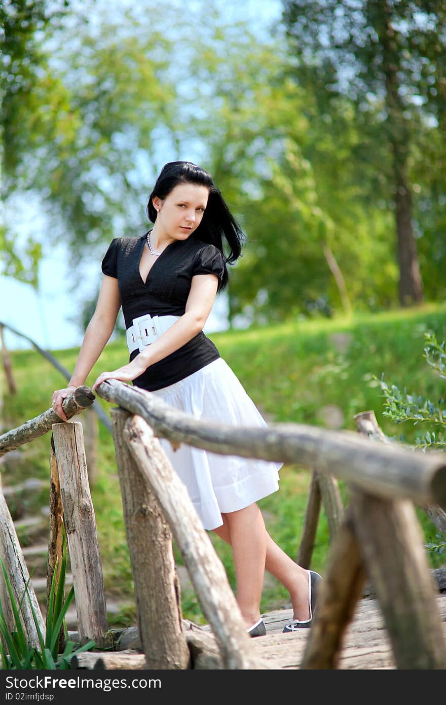 Young girl on the bridge