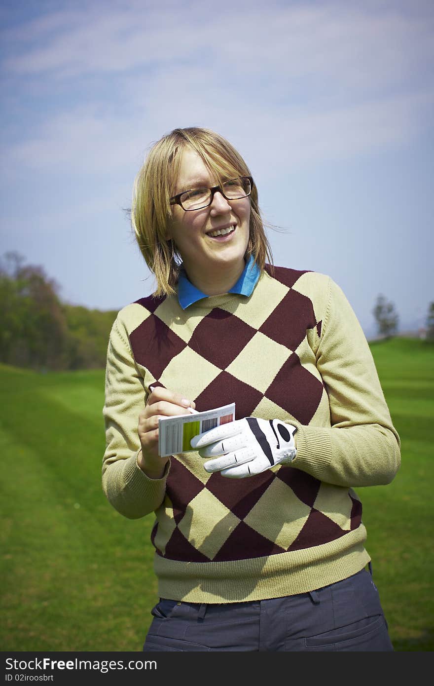 Golfer woman writing handicap