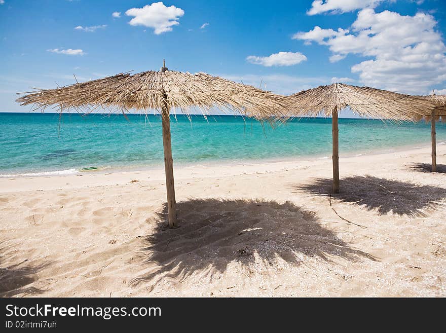 Umbrellas on the beach in summer. Umbrellas on the beach in summer