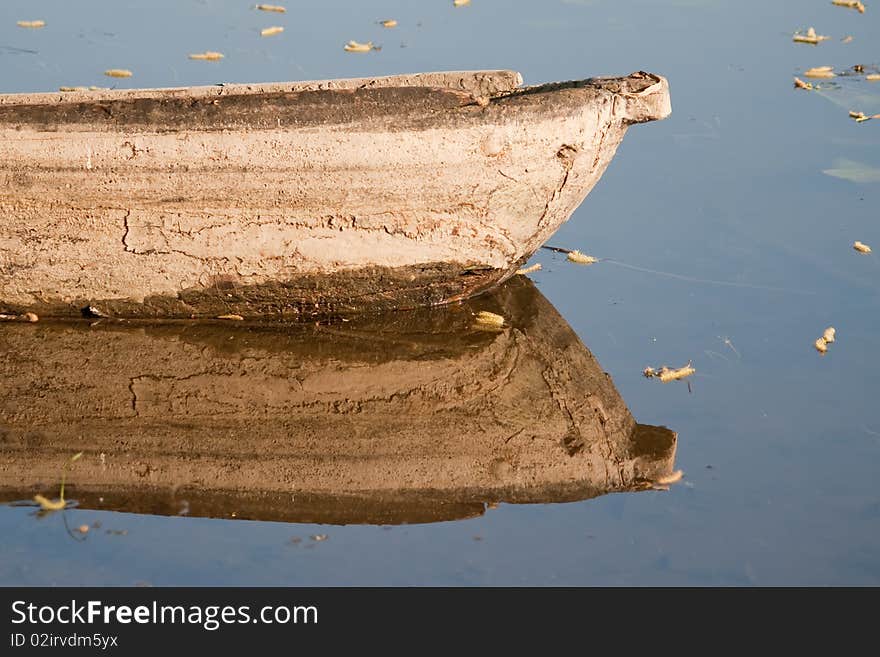 Old fishing boat from the river bank. morning