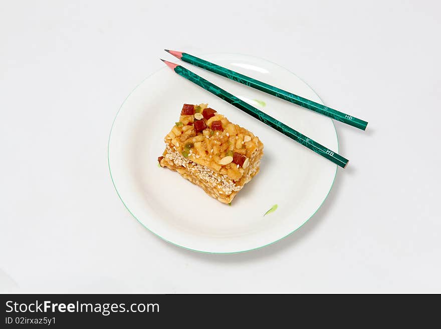 Cake and pencil