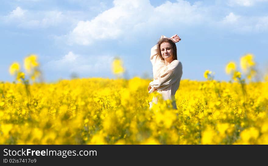 Happy Girl In Yellow Flowers