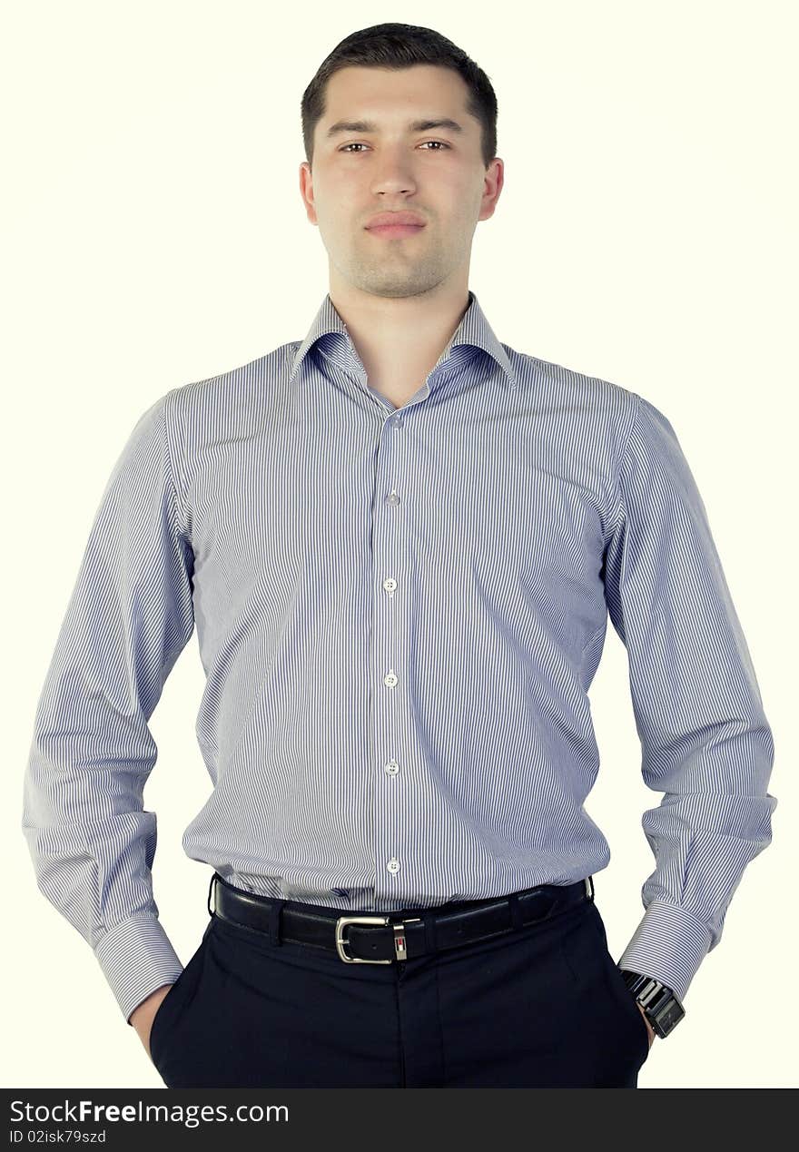 Young man posing on a white background. Young man posing on a white background