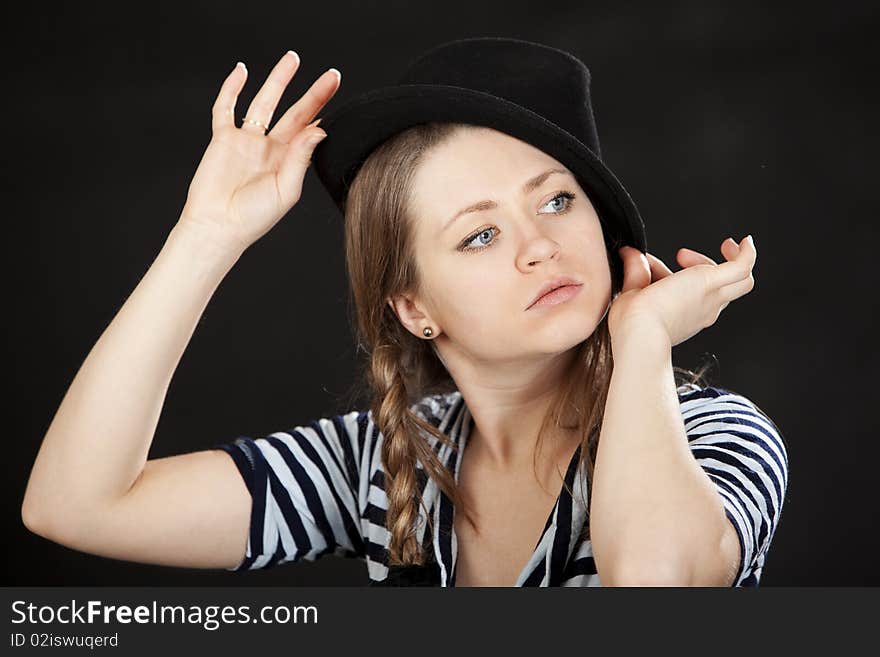 Beautiful woman blue eyes. Isolated over black background. Beautiful woman blue eyes. Isolated over black background