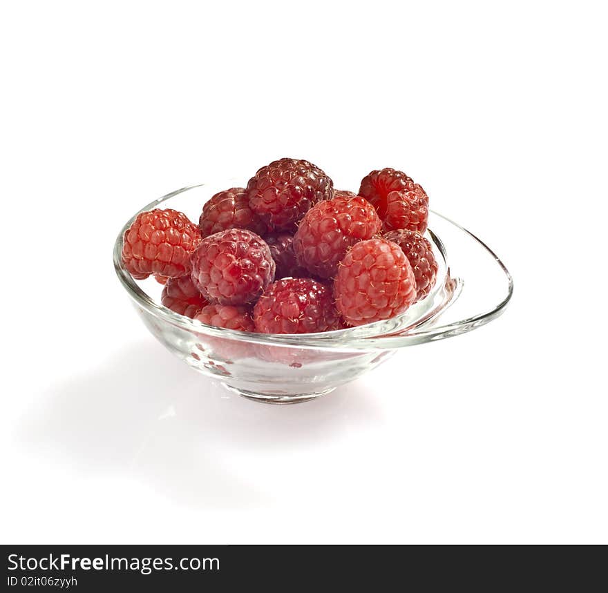 Freshly picked raspberries on white background