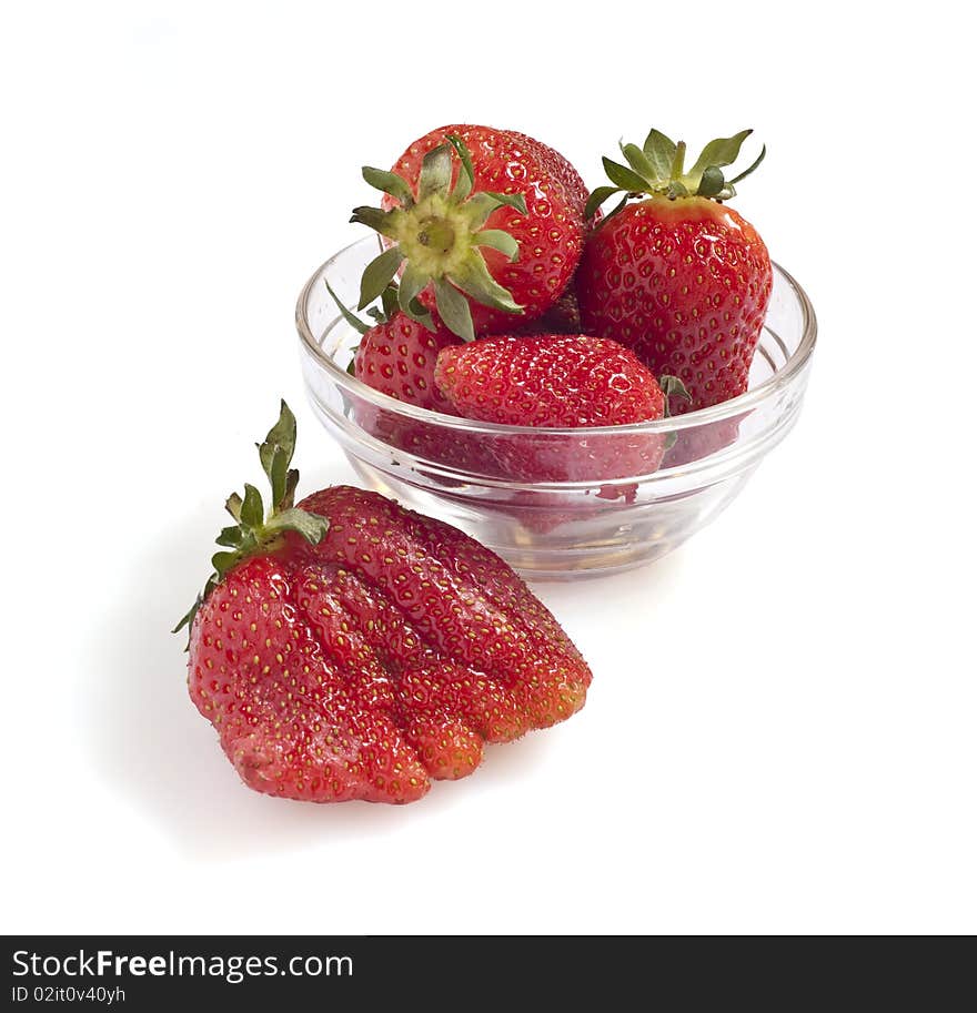 Freshly picked strawberries on a white background. Freshly picked strawberries on a white background