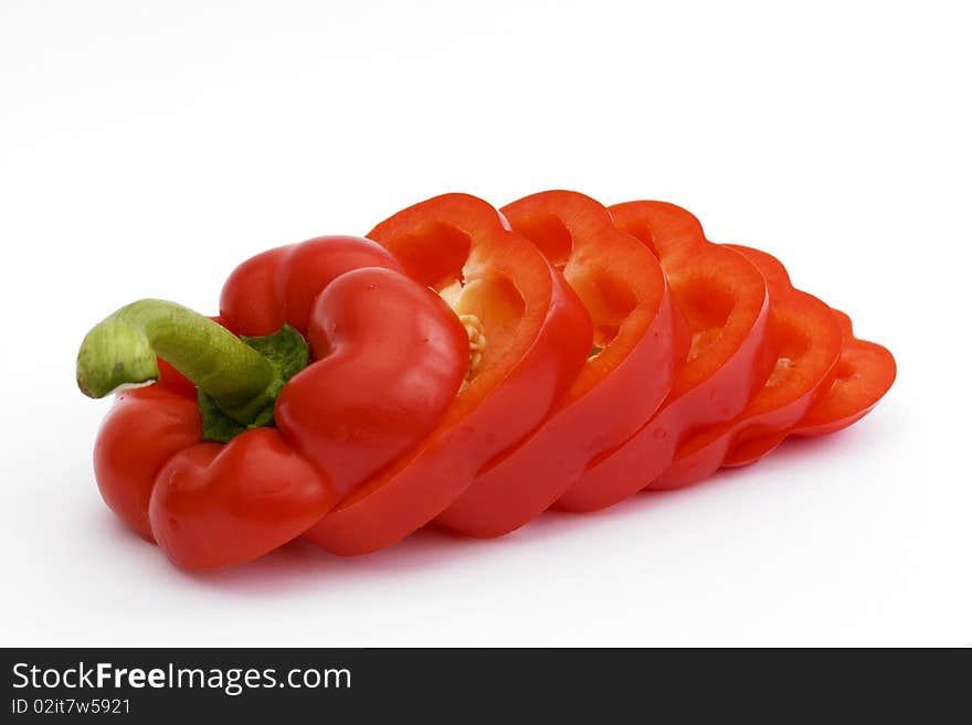 Sliced red pepper on white