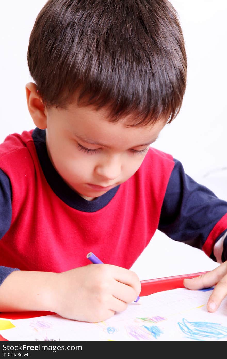 Five years old child writing, White background