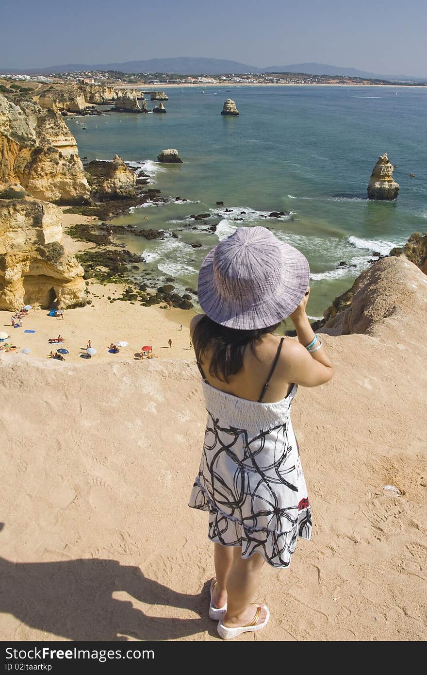 Woman watches the sea